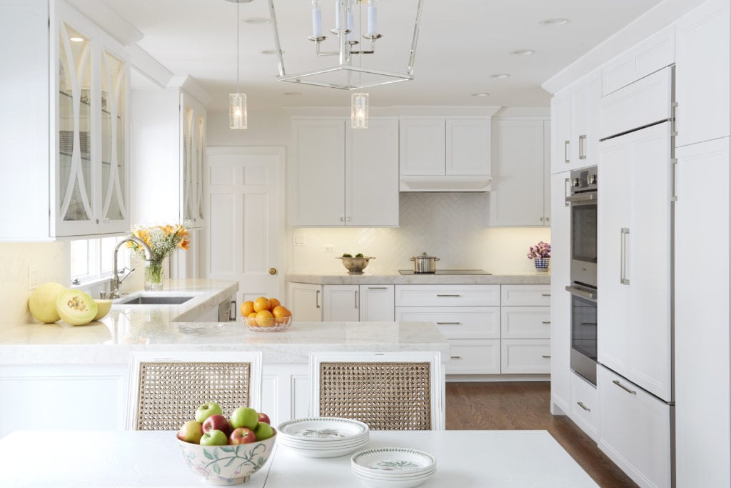 Kitchen remodel with white cabinetry and island