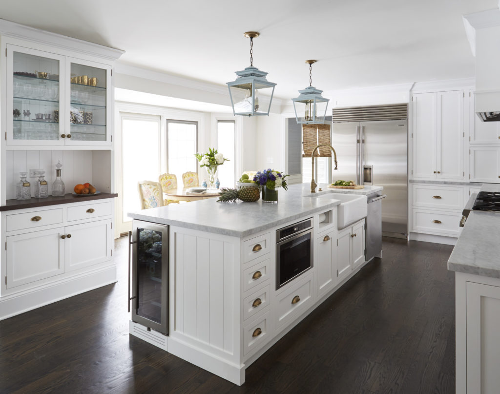 Kitchen remodel with white cabinetry and island