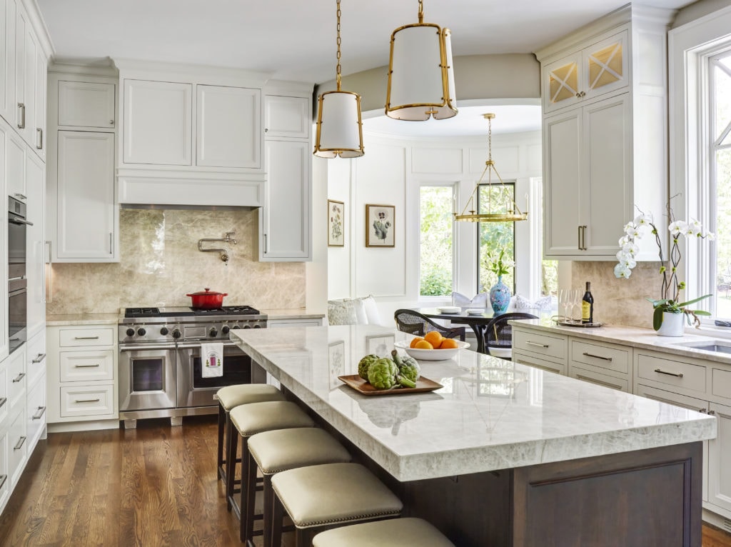 Kitchen remodel with white cabinetry and large island